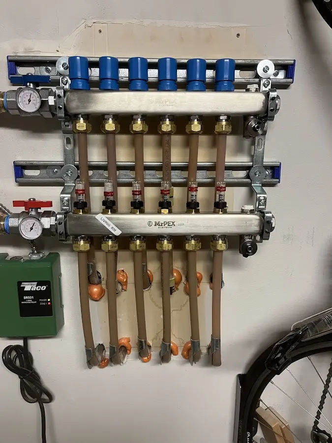 Plumber performing Gas Line Installation at a residential property in Castle Pines