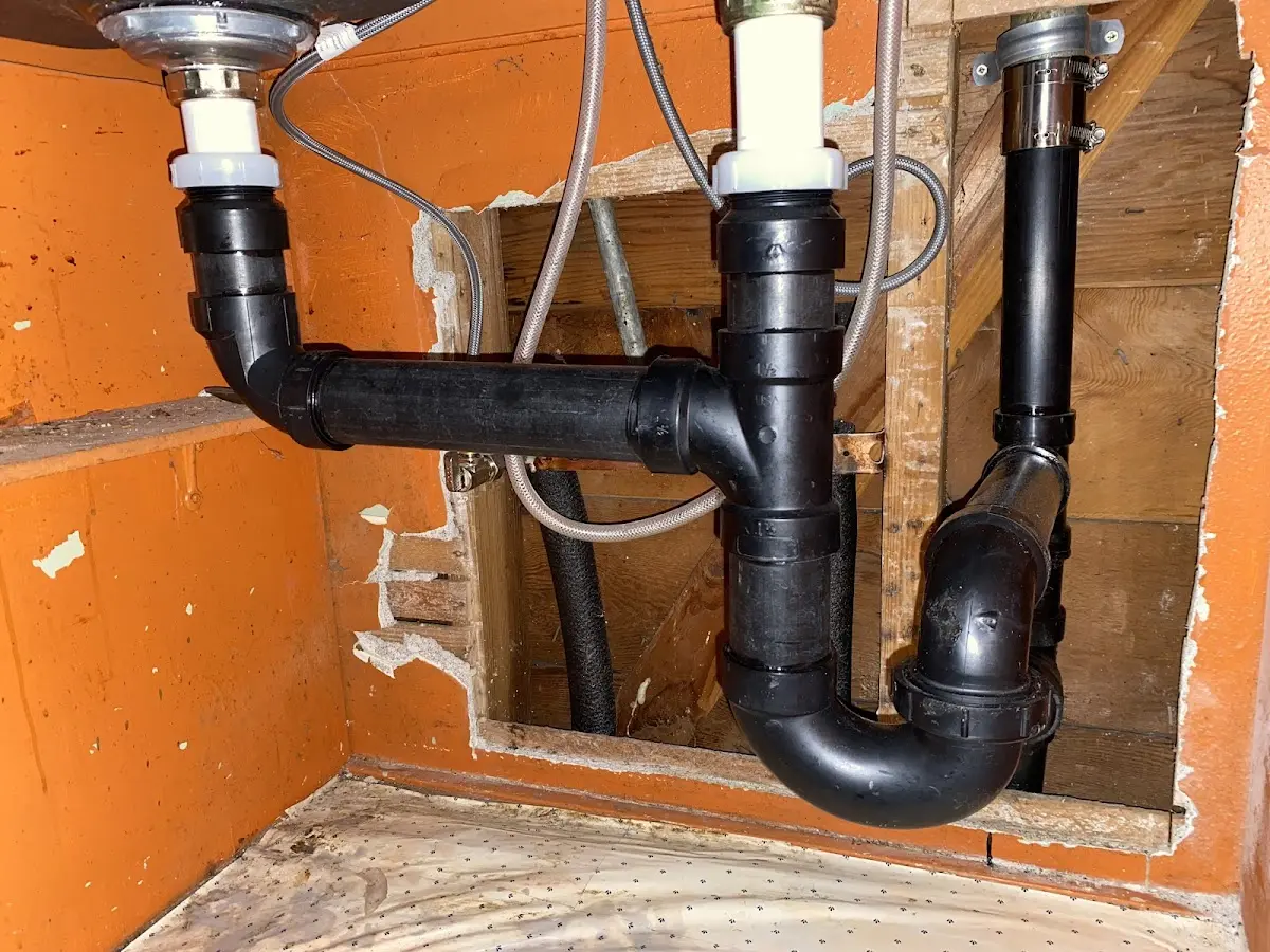 Professional Garbage Disposal Repair equipment and tools on the job in Castle Pines
